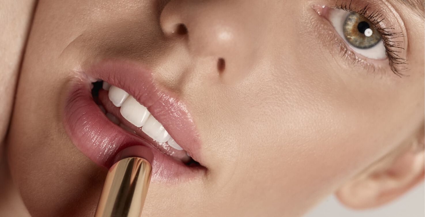 Model wearing Phyto-Lip Balm moisturising lip balm crush shade